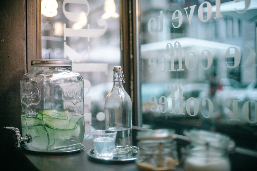 jug of water with sliced cucumber